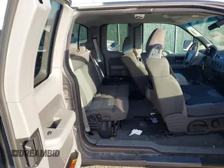 2005 Ford F-150 STX with VIN 1FTRX12W15KD34012, listed as a IAAI auction lot 41095300 with 178,984 mi miles. Bid and sale history available at carsss.com. Image 8.