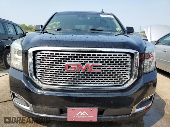 2015 GMC Yukon Denali with VIN 1GKS2CKJXFR547358, listed as a Copart auction lot 63906734 with 163,980 mi miles and Salvage Title. Bid and sale history available at carsss.com. Image 5.