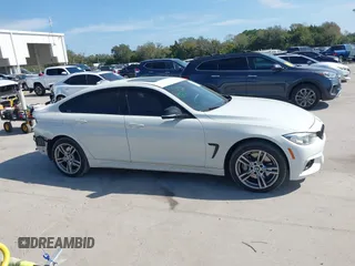 2016 BMW 4 Series 435i xDrive with VIN WBA4B3C58GG528016, listed as a IAAI auction lot 41506077 with 87,975 mi miles and . Bid and sale history available at DreamBid. Image 13.
