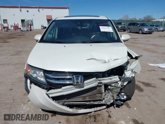 2016 Honda Odyssey EX-L z VIN 5FNRL5H65GB055317, wystawiony jako IAAI lot #41825497 z przebiegiem 117 672 mil mil oraz . Historia ofert i sprzedaży dostępna na DreamBid. Obrazek 13.