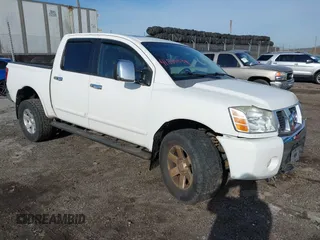2007 Nissan Titan XE z VIN 1N6AA07B77N244215, wystawiony jako IAAI lot #41880030 z przebiegiem 138 405 mil mil oraz . Historia ofert i sprzedaży dostępna na DreamBid. Obrazek 1.
