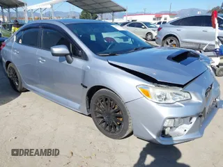2015 Subaru WRX Premium with VIN JF1VA1D66F9814459, listed as a IAAI auction lot 41831344 with 74,892 mi miles. Bid and sale history available at carsss.com. Image 1.