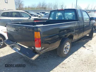 1997 Nissan Frontier XE with VIN 1N6SD16S8VC423231, listed as a IAAI auction lot 41609302 with 233,168 mi miles and . Bid and sale history available at DreamBid. Image 4.