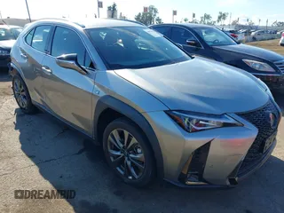 2021 Lexus UX 250h F Sport with VIN JTHE9JBH8M2051954, listed as a IAAI auction lot 40978984 with 60,276 mi miles and . Bid and sale history available at DreamBid. Image 1.
