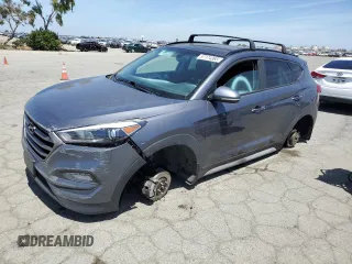2018 Hyundai Tucson Value z VIN KM8J33A29JU623782, wystawiony jako Copart lot #57174365 z przebiegiem 148 401 mil mil oraz Szkoda całkowita • Salvage title. Historia ofert i sprzedaży dostępna na DreamBid. Obrazek 1.