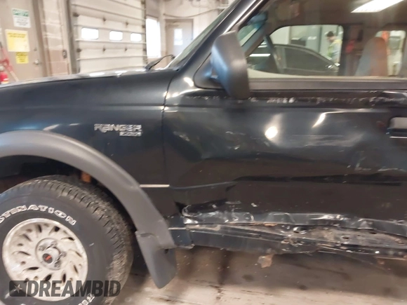 1999 Ford Ranger XL with VIN 1FTZR15V4XPB56809, listed as a IAAI auction lot 41874991 with 165,487 mi miles. Bid and sale history available at carsss.com. Image 6.