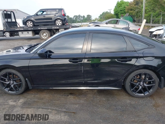 2022 Honda Civic Sport z VIN 2HGFE2F50NH604212, wystawiony jako IAAI lot #42042596 z przebiegiem 40 634 mil mil oraz . Historia ofert i sprzedaży dostępna na DreamBid. Obrazek 14.