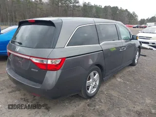 2012 Honda Odyssey Touring with VIN 5FNRL5H99CB071010, listed as a IAAI auction lot 41651233 with 186,913 mi miles. Bid and sale history available at carsss.com. Image 4.