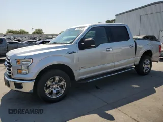 2015 Ford F-150 XL with VIN 1FTEW1CP4FFA57780, listed as a Copart auction lot 64268785 with 160,714 mi miles and Salvage title. Bid and sale history available at DreamBid. Image 1.