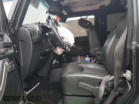 2017 Jeep Wrangler Sport z VIN 1C4AJWAG4HL563093, wystawiony jako Copart lot #51603125 z przebiegiem 105 618 mil mil oraz Szkoda całkowita • Salvage title. Historia ofert i sprzedaży dostępna na DreamBid. Obrazek 7.