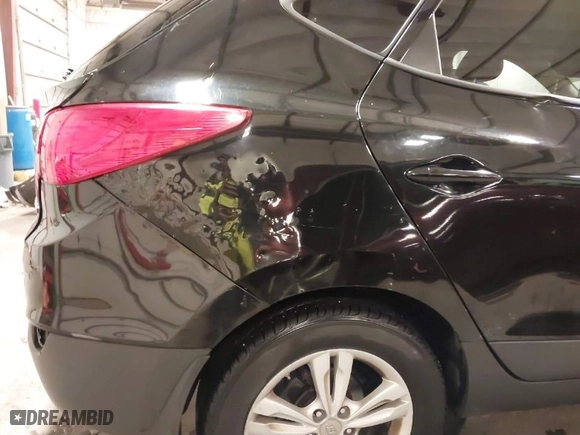 2013 Hyundai Tucson GLS with VIN KM8JU3AC0DU754948, listed as a IAAI auction lot 41811891 with 139,056 mi miles. Bid and sale history available at carsss.com. Image 19.