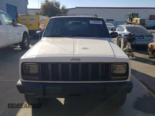 2000 Jeep Cherokee SE with VIN 1J4FF28S5YL243656, listed as a Copart auction lot 71364434 with 222,032 mi miles and Salvage Title. Bid and sale history available at carsss.com. Image 5.