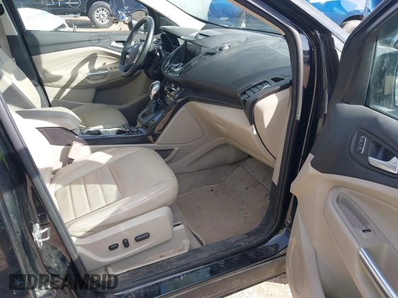 2016 Ford Escape Titanium with VIN 1FMCU9JX4GUB38303, listed as a IAAI auction lot 41788421 with 138,511 mi miles and . Bid and sale history available at DreamBid. Image 5.