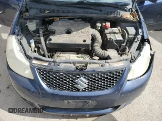 2009 Suzuki SX4 Sport FWD z VIN JS2YC414496202360, wystawiony jako Copart lot #48233305 z przebiegiem 196 937 mil mil oraz Szkoda całkowita • Salvage title. Historia ofert i sprzedaży dostępna na DreamBid. Obrazek 12.