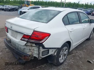 2013 Honda Civic LX with VIN 2HGFB2F52DH515815, listed as a IAAI auction lot 42379435 with 242,268 mi miles and . Bid and sale history available at DreamBid. Image 4.