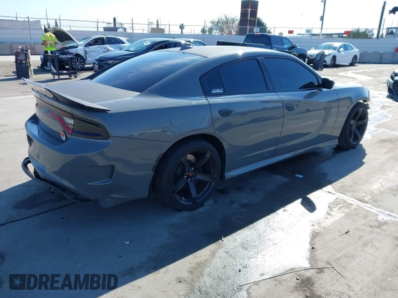 2019 Dodge Charger Scat Pack with VIN 2C3CDXGJ4KH576394, listed as a IAAI auction lot 41846702 with 70,209 mi miles and . Bid and sale history available at DreamBid. Image 4.