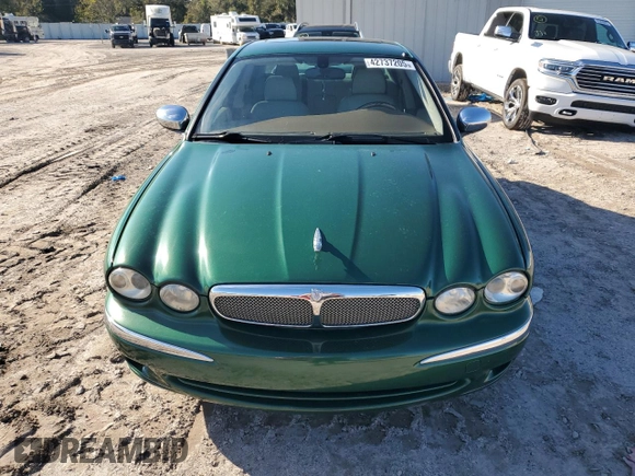2007 Jaguar X-Type z VIN SAJWA51A87WJ07995, wystawiony jako Copart lot #42737205 z przebiegiem 82 863 mil mil oraz Tytuł czysty. Historia ofert i sprzedaży dostępna na DreamBid. Obrazek 5.