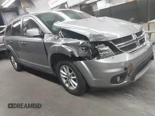 2018 Dodge Journey SXT with VIN 3C4PDCBB9JT141334, listed as a IAAI auction lot 41060515 with 144,500 mi miles and . Bid and sale history available at DreamBid. Image 1.