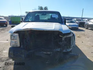 2014 Ford F-250 XL z VIN 1FT7X2A64EEB68906, wystawiony jako IAAI lot #41195294 z przebiegiem 222 445 mil mil oraz . Historia ofert i sprzedaży dostępna na DreamBid. Obrazek 12.