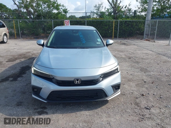 2023 Honda Civic Touring with VIN 2HGFE1F91PH305053, listed as a IAAI auction lot 42378311 with 41,576 mi miles and . Bid and sale history available at DreamBid. Image 13.
