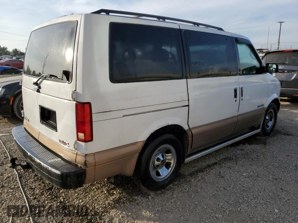 1999 GMC Safari z VIN 1GKDM19W2XB502093, wystawiony jako Copart lot #81719764 z przebiegiem 107 191 mil mil oraz Tytuł czysty. Historia ofert i sprzedaży dostępna na DreamBid. Obrazek 3.