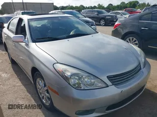 2004 Lexus ES 330 with VIN JTHBA30G045016212, listed as a IAAI auction lot 42057870 with 261,935 mi miles. Bid and sale history available at carsss.com. Image 1.