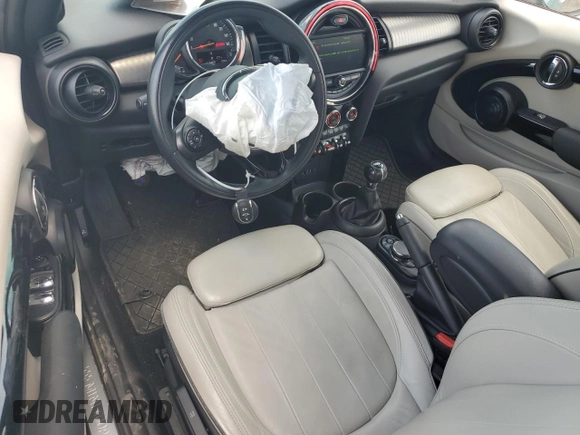 2018 MINI Convertible Cooper S with VIN WMWWG9C59J3D22587, listed as a Copart auction lot 61673415 with 34,935 mi miles and Salvage title. Bid and sale history available at DreamBid. Image 8.