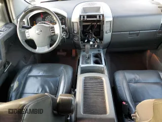 2006 Nissan Titan LE z VIN 1N6BA07B86N546972, wystawiony jako Copart lot #74983924 z przebiegiem 225 495 mil mil oraz Szkoda całkowita • Salvage title. Historia ofert i sprzedaży dostępna na DreamBid. Obrazek 8.