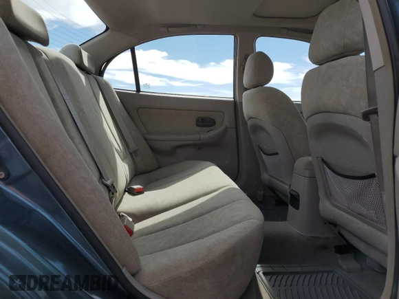 2003 Hyundai Elantra GLS z VIN KMHDN45D03U468955, wystawiony jako Copart lot #50207515 z przebiegiem 123 560 mil mil oraz Czysty tytuł • Clean title. Historia ofert i sprzedaży dostępna na DreamBid. Obrazek 10.