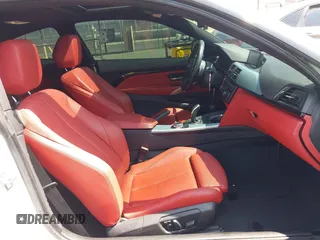 2015 BMW 4 Series 428i z VIN WBA3N7C55FK222364, wystawiony jako IAAI lot #42604632 z przebiegiem 108 157 mil mil oraz . Historia ofert i sprzedaży dostępna na DreamBid. Obrazek 5.