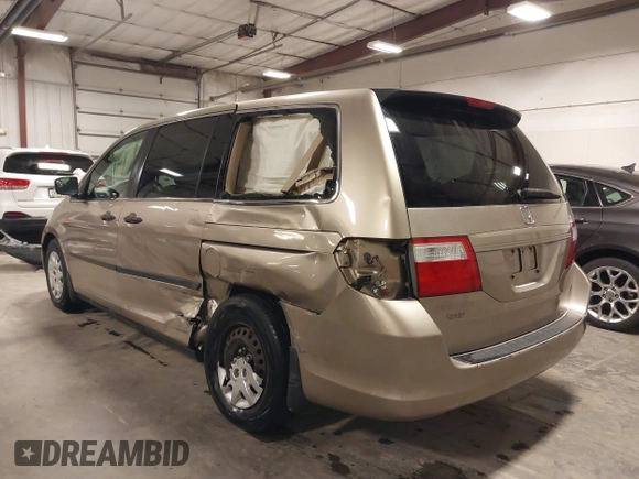 2006 Honda Odyssey LX with VIN 5FNRL38256B113667, listed as a IAAI auction lot 41856860 with 142,031 mi miles. Bid and sale history available at carsss.com. Image 3.