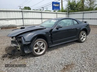 2002 Ford Mustang GT Deluxe with VIN 1FAFP42X62F236827, listed as a Copart auction lot 56749845 with 60,665 mi miles and Salvage title. Bid and sale history available at DreamBid. Image 1.
