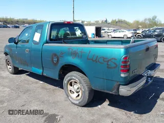 1997 Ford F-150 z VIN 1FTDX1768VNA88478, wystawiony jako IAAI lot #42080621 z przebiegiem 159 160 mil mil oraz . Historia ofert i sprzedaży dostępna na DreamBid. Obrazek 3.