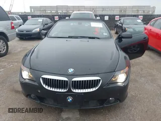 2006 BMW 6 Series 650Ci z VIN WBAEK13416CN79394, wystawiony jako IAAI lot #42420470 z przebiegiem 114 720 mil mil oraz . Historia ofert i sprzedaży dostępna na DreamBid. Obrazek 6.