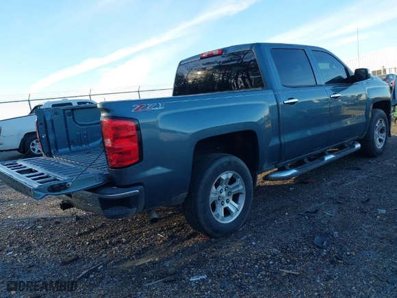 2014 Chevrolet Silverado 1500 LT with VIN 3GCUKREC4EG313736, listed as a IAAI auction lot 41309331 with 213,225 mi miles. Bid and sale history available at carsss.com. Image 4.