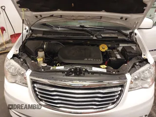 2015 Chrysler Town & Country Touring with VIN 2C4RC1BG9FR626482, listed as a IAAI auction lot 41879865 with 129,694 mi miles and . Bid and sale history available at DreamBid. Image 10.