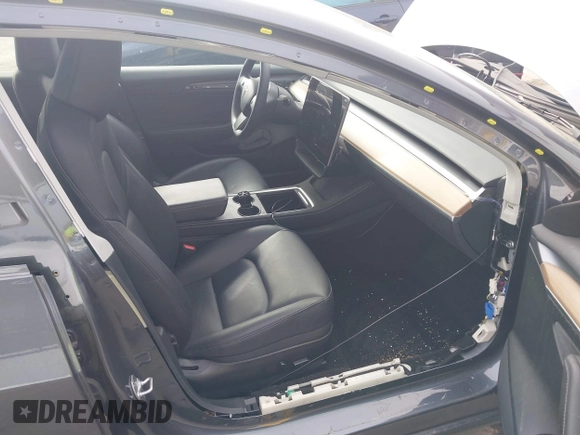 2023 Tesla Model 3 z VIN 5YJ3E1EA0PF577869, wystawiony jako IAAI lot #41468956 z przebiegiem 38 760 mil mil oraz . Historia ofert i sprzedaży dostępna na DreamBid. Obrazek 5.