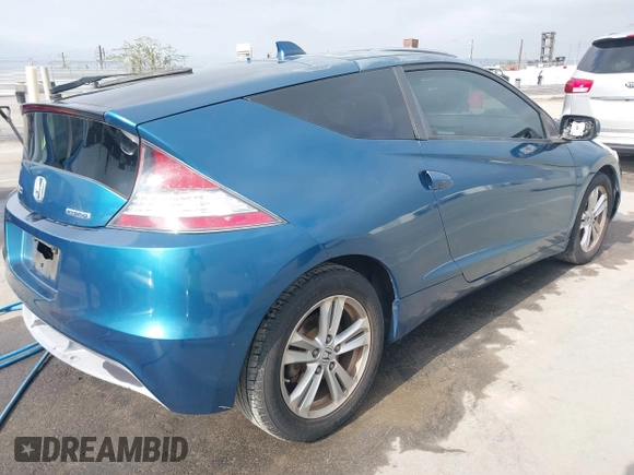 2012 Honda CR-Z with VIN JHMZF1D45CS004237, listed as a IAAI auction lot 42598638 with 60,896 mi miles and . Bid and sale history available at DreamBid. Image 4.