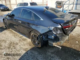 2024 Honda Civic Sedan Touring with VIN 2HGFE1F92RH325802, listed as a Copart auction lot 43206405 with 22,850 mi miles and Salvage Title. Bid and sale history available at carsss.com. Image 2.