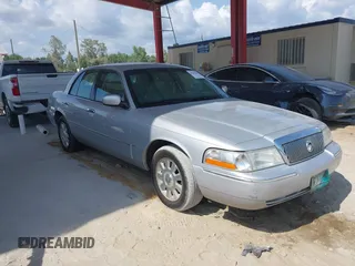 2003 Mercury Grand Marquis LS Premium z VIN 2MEFM75W83X631023, wystawiony jako IAAI lot #42227245 z przebiegiem 114 235 mil mil oraz . Historia ofert i sprzedaży dostępna na DreamBid. Obrazek 1.