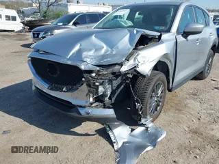 2019 Mazda CX-5 Sport with VIN JM3KFBBM7K0668830, listed as a IAAI auction lot 42069505 with Not Provided miles and . Bid and sale history available at DreamBid. Image 6.