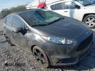 2019 Ford Fiesta ST with VIN 3FADP4GX5KM141899, listed as a IAAI auction lot 41895079 with 26,189 mi miles. Bid and sale history available at carsss.com. Image 1.