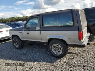1990 Ford Bronco z VIN 1FMCU14T4LUA75868, wystawiony jako Copart lot #74209254 z przebiegiem 828 308 mil mil oraz Szkoda całkowita • Salvage title. Historia ofert i sprzedaży dostępna na DreamBid. Obrazek 2.