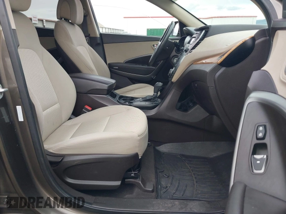 2014 Hyundai Santa Fe z VIN 5XYZTDLB1EG144290, wystawiony jako IAAI lot #42126367 z przebiegiem 138 525 mil mil oraz . Historia ofert i sprzedaży dostępna na DreamBid. Obrazek 5.