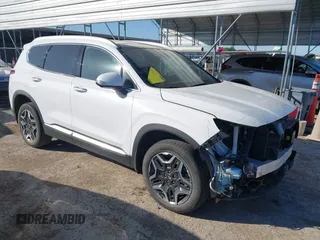 2023 Hyundai Santa Fe Limited z VIN 5NMS5DA19PH010481, wystawiony jako IAAI lot #41951919 z przebiegiem 31 667 mil mil oraz . Historia ofert i sprzedaży dostępna na DreamBid. Obrazek 1.