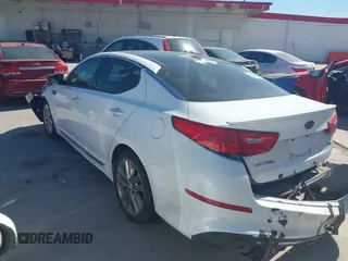 2015 Kia Optima SXL Turbo with VIN 5XXGR4A61FG428391, listed as a IAAI auction lot 41869452 with 63,130 mi miles and . Bid and sale history available at DreamBid. Image 3.