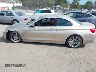 2015 BMW 4 Series 435i xDrive with VIN WBA3T7C51FP942320, listed as a IAAI auction lot 42059717 with 81,815 mi miles and . Bid and sale history available at DreamBid. Image 14.