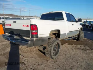 2002 Dodge 2500 with VIN 3B7KF23672M273990, listed as a IAAI auction lot 41354174 with 198,542 mi miles and . Bid and sale history available at DreamBid. Image 4.