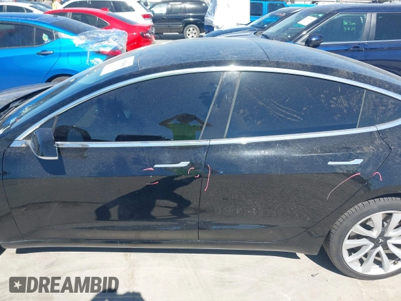 2020 Tesla Model 3 Standard Range Plus with VIN 5YJ3E1EAXLF614002, listed as a IAAI auction lot 41758898 with 42,363 mi miles and . Bid and sale history available at DreamBid. Image 14.