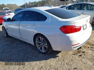 2016 BMW 4 Series 428i with VIN WBA4A9C56GGL87968, listed as a IAAI auction lot 41441524 with 134,065 mi miles. Bid and sale history available at carsss.com. Image 3.